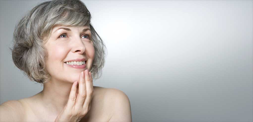Mature Woman Happy with her Results from the Chemical Peel Treatment.